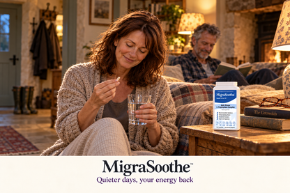 Judy, the same auburn-haired woman from the family scenes, holding a capsule and water by her sofa beside the L-Tryptophan bottle; her husband reads nearby.